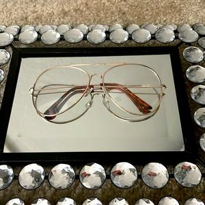 Tortoise and gold clear aviators.